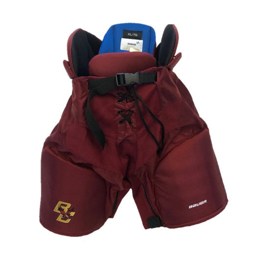 Bauer Nexus - Pantalon de hockey NCAA Pro Stock pour femme (marron)